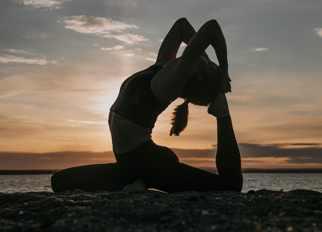 Yoga practitioner performing flexibility stretch